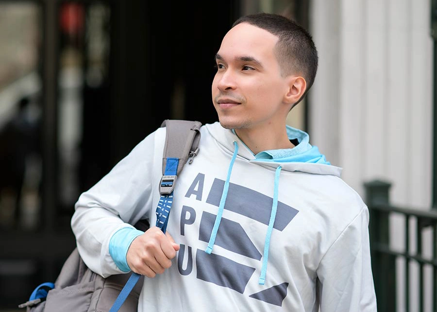 Group of students wearing a APU-branded gear at Times Square in New York City